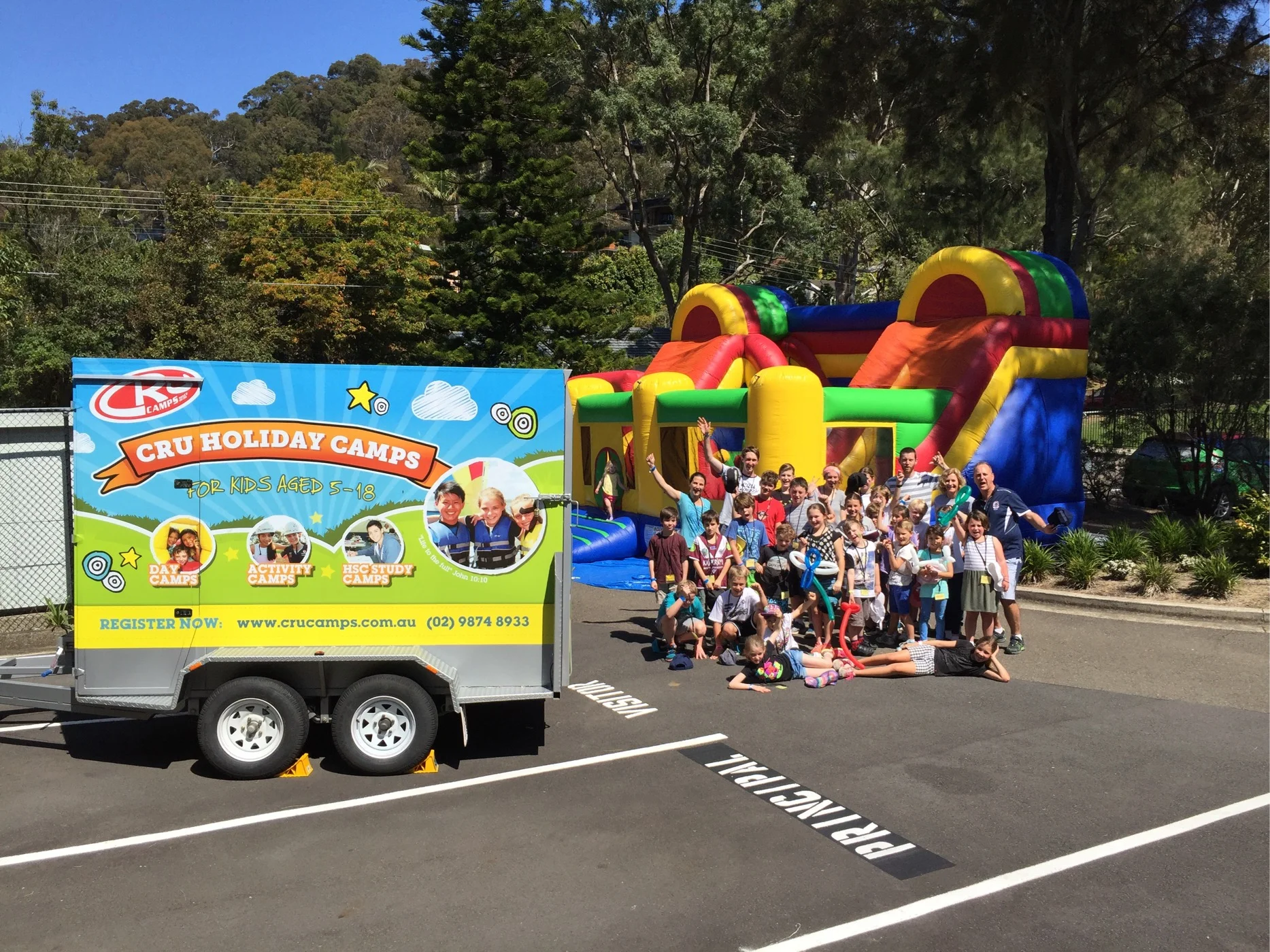 Trailer, kids and jumping castle.JPG