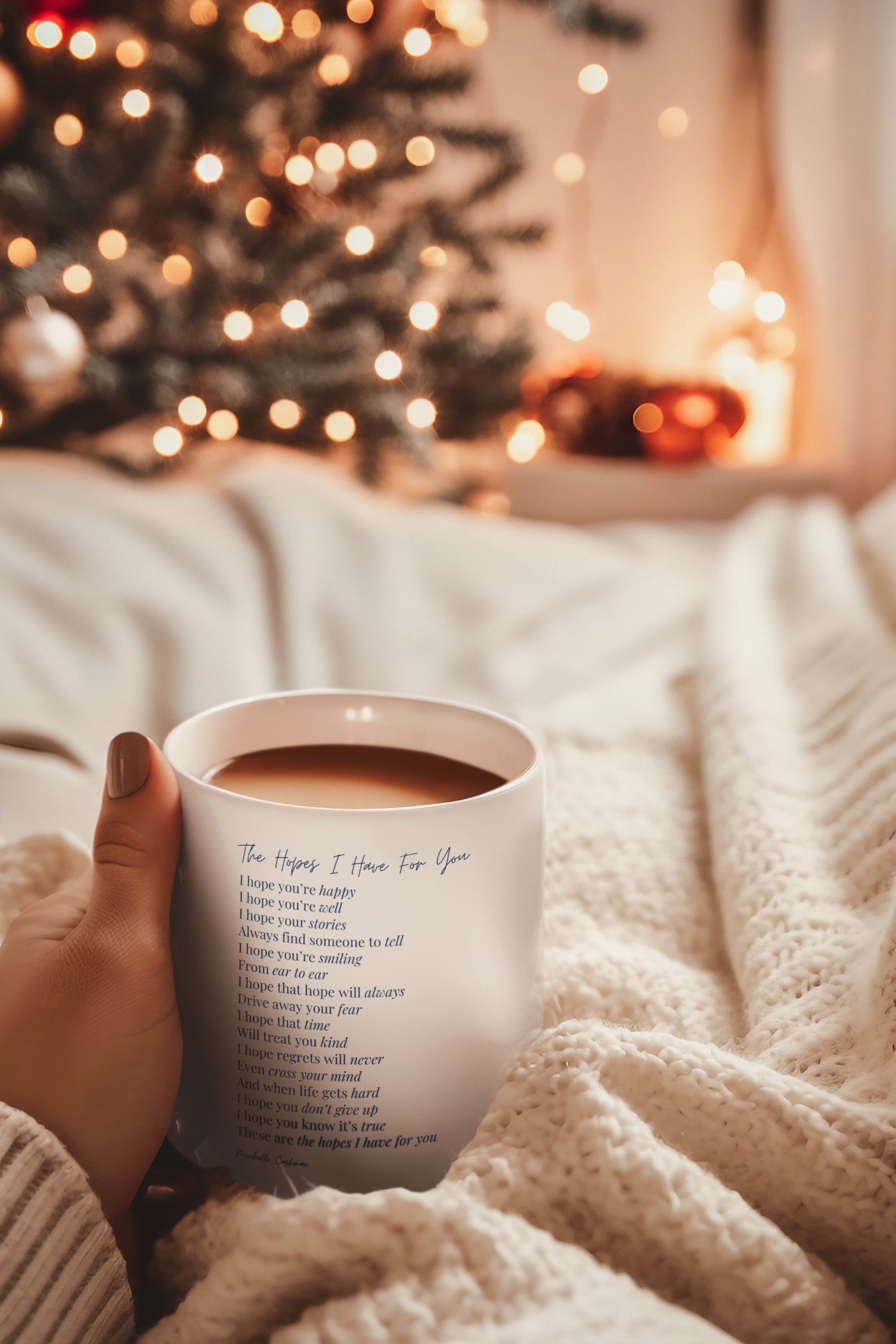 coffee-mug-mockup-of-a-woman-lying-on-her-bed-in-front-of-a-christmas-tree-m36529.png