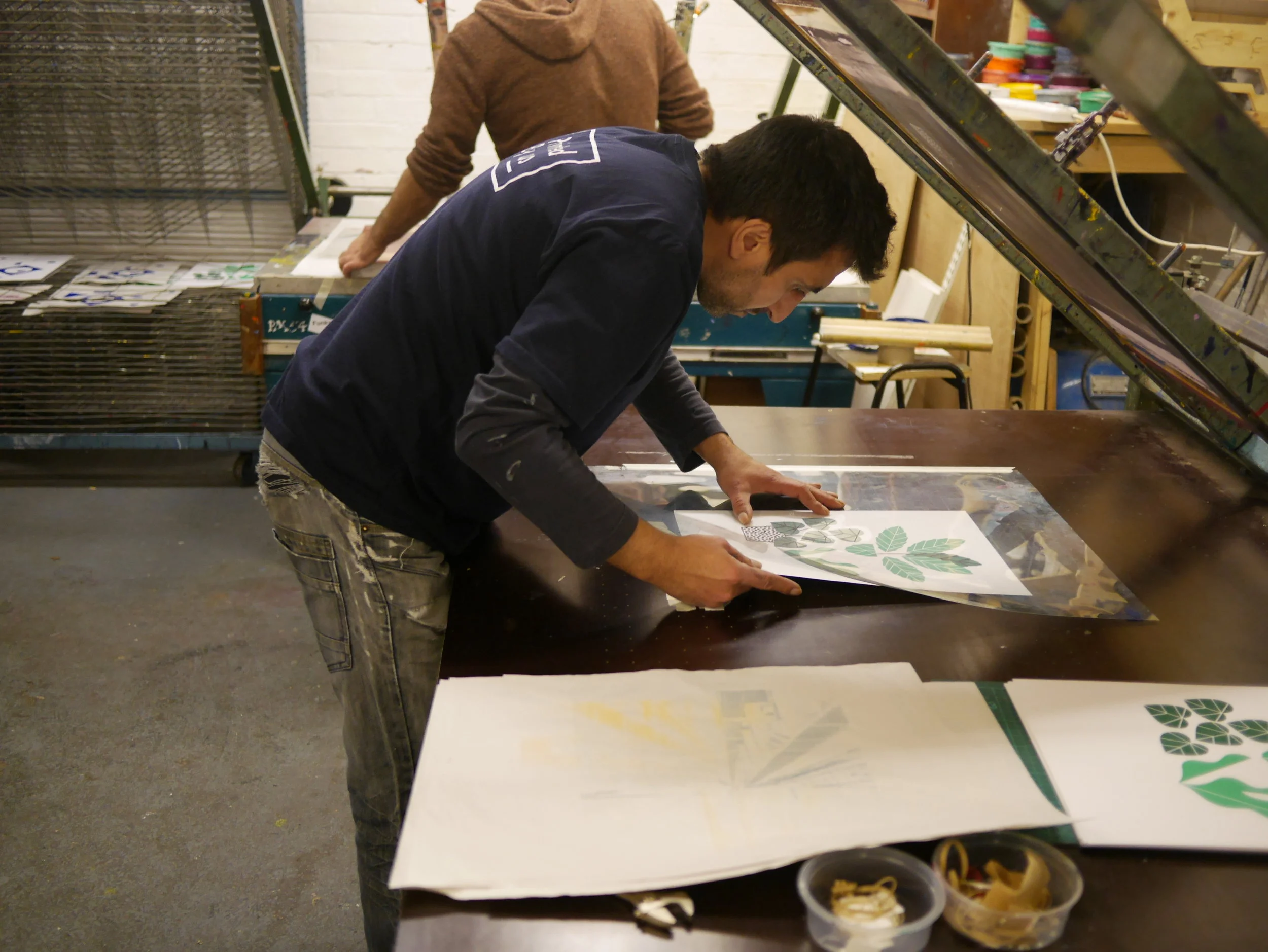 Hugo carefully lining up colour 3 of the House Plants prints.