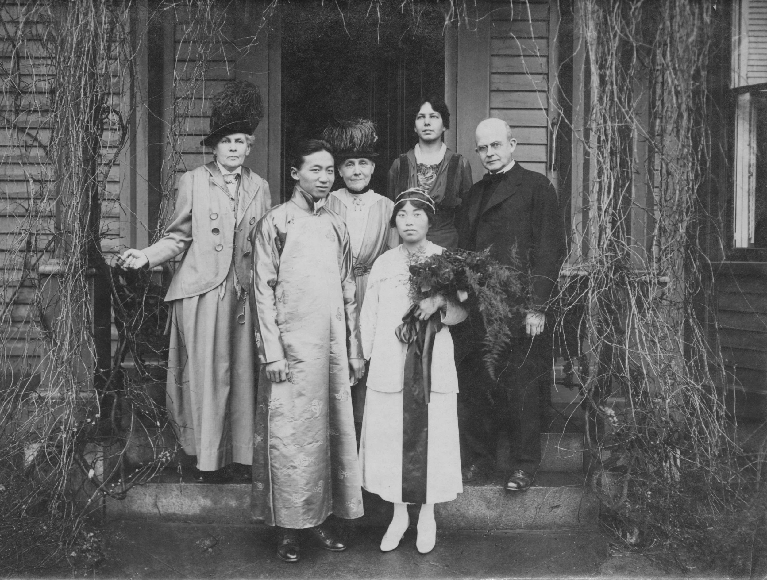 Wedding picture of Yang-Mo Kuo (Class of 1917, MS 1919) and Wai-Tsu New (of Radcliffe) in 1918. Left to right in the back: Mary R. Cabot, Grace Cabot Holbrook, Grace Ware Holbrook Haskell, Reverend W Dewees Roberts. Courtesy of Veronica Haskell (granddaughter-in-law of Grace Haskell). (See Kuo profile.)