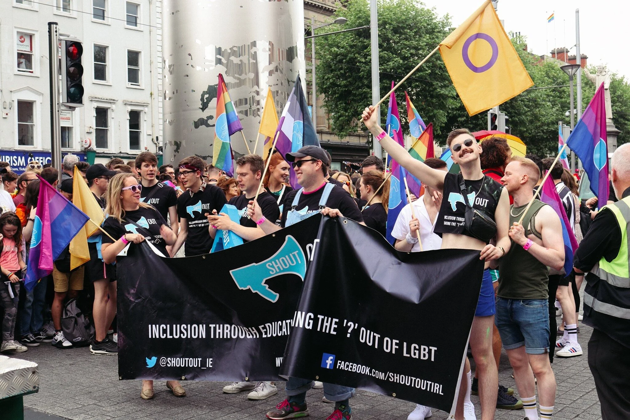 ShoutOut at Pride flying the Intersex Flag