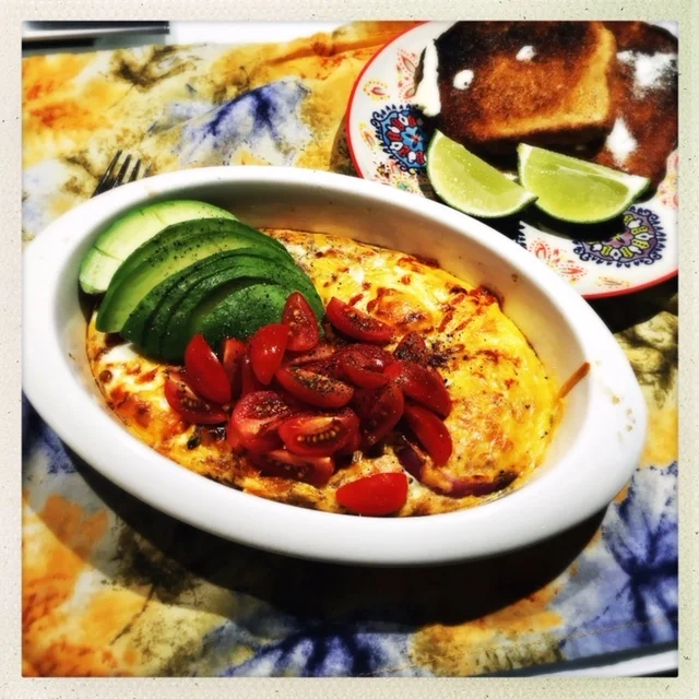 Ready to serve. Finish the eggs with whatever toppings you'd like, including hot sauce, cilantro, sour cream....