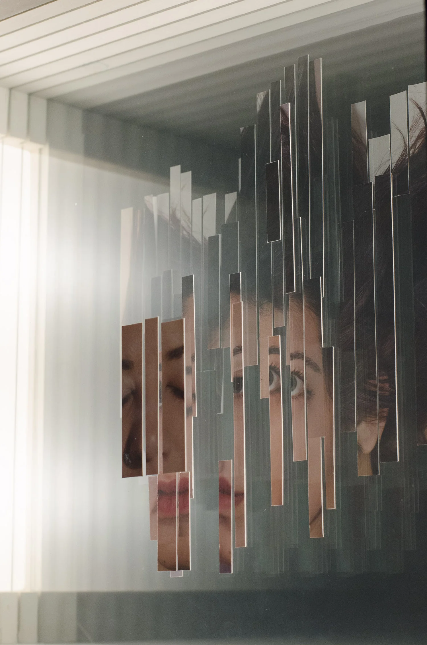 Sydney Bejcar, ScanTran, Photo Collage on glass, wooden lightbox with LED lights, 18 x 7 x 6”, 2016
