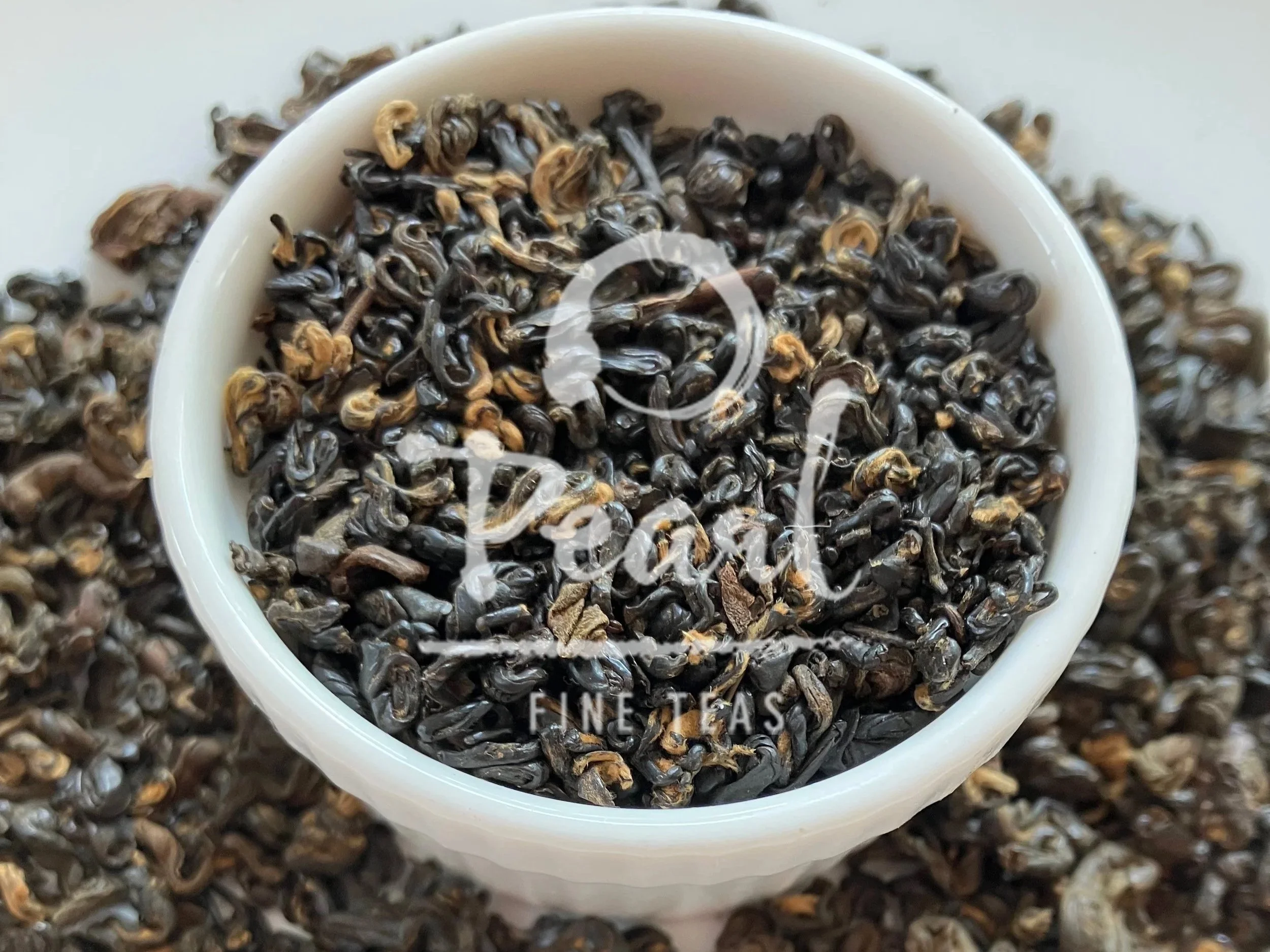 Black tea from Nepals Mt Everest in a white bowl