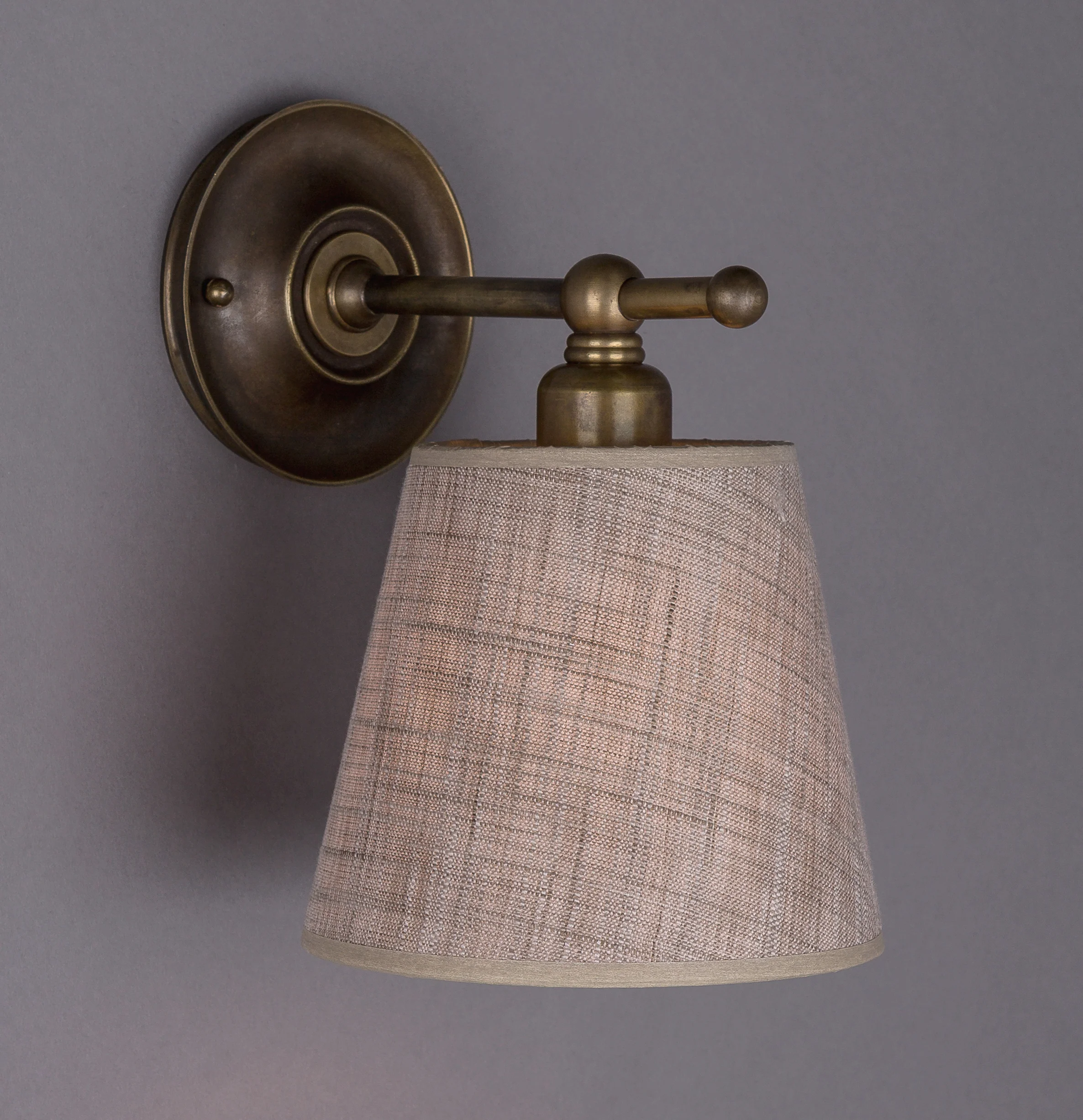 Inverted Dexter Sconce Dark antique brass / 260 beige linen shade.