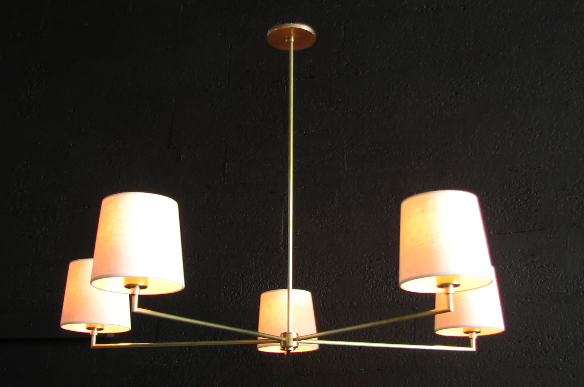 Jasper J Five Arm Chandelier Hand polished brass / parchment shades.