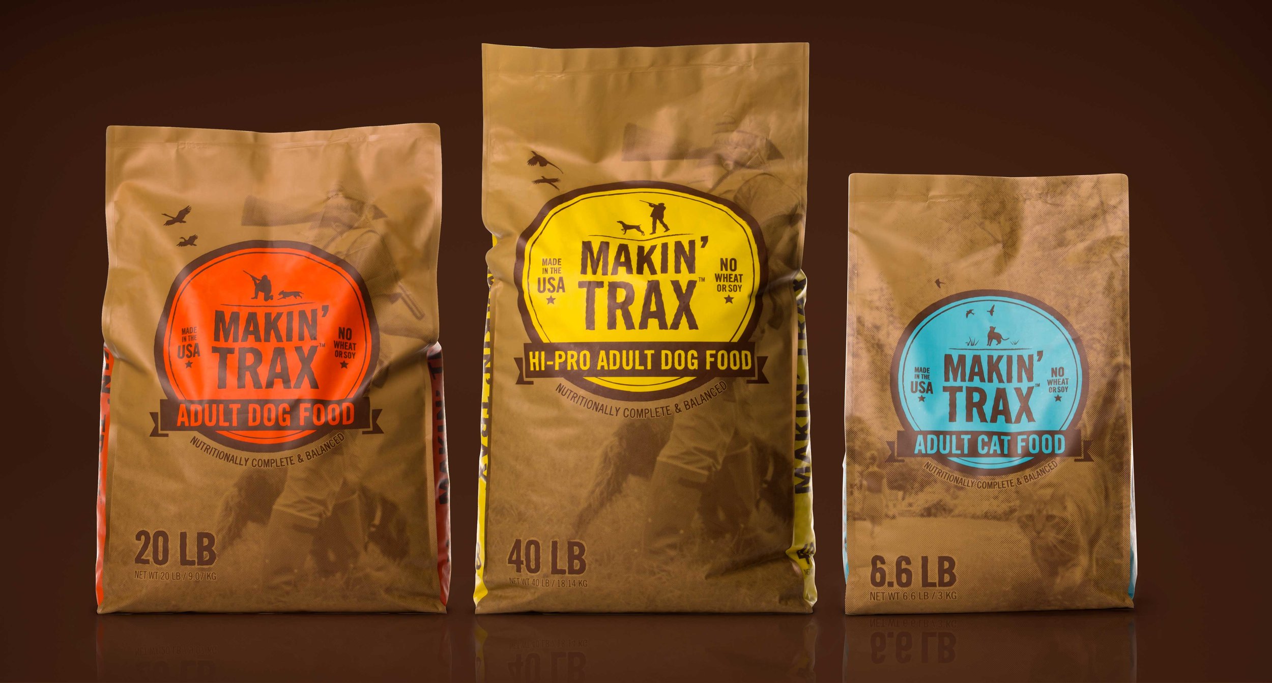 *Three package designs for Makin' Trax dog food brand