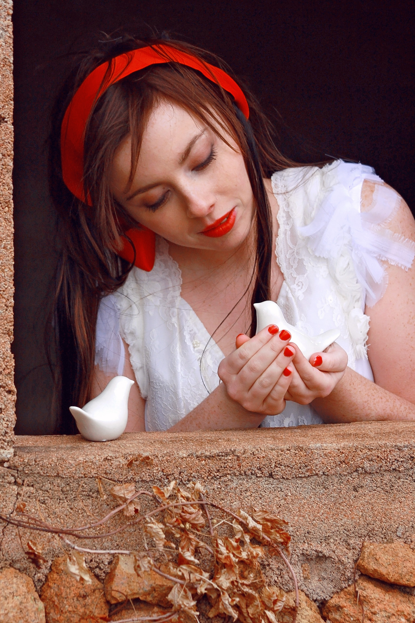 snow white themed shoot caring for the birds.jpg