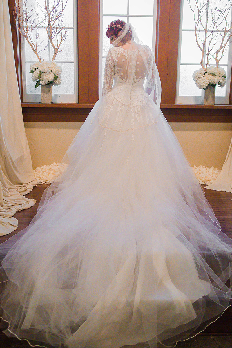 Vintage Bride in her dress with a long train.jpg