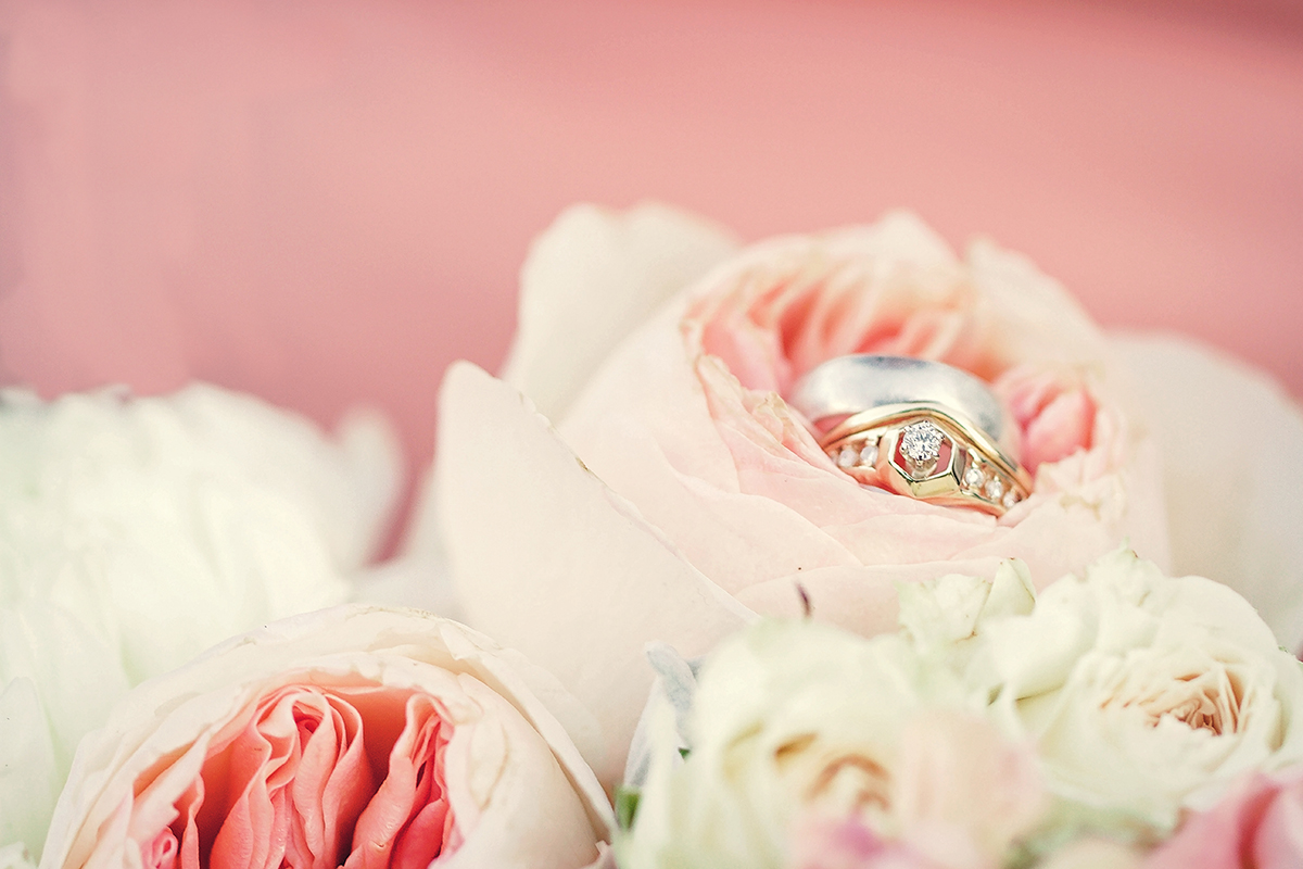 Vintage rings nestled amidst a floral bouquet.jpg