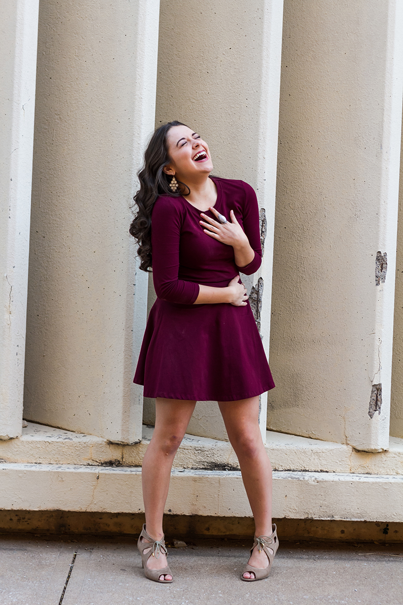 Senior Girl in Red Dress Laughing.jpg