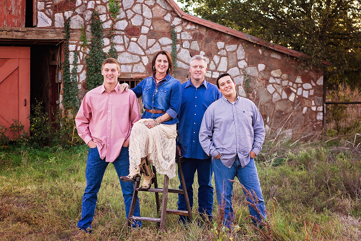 Portrait of Family of 4 outside a barn.jpg