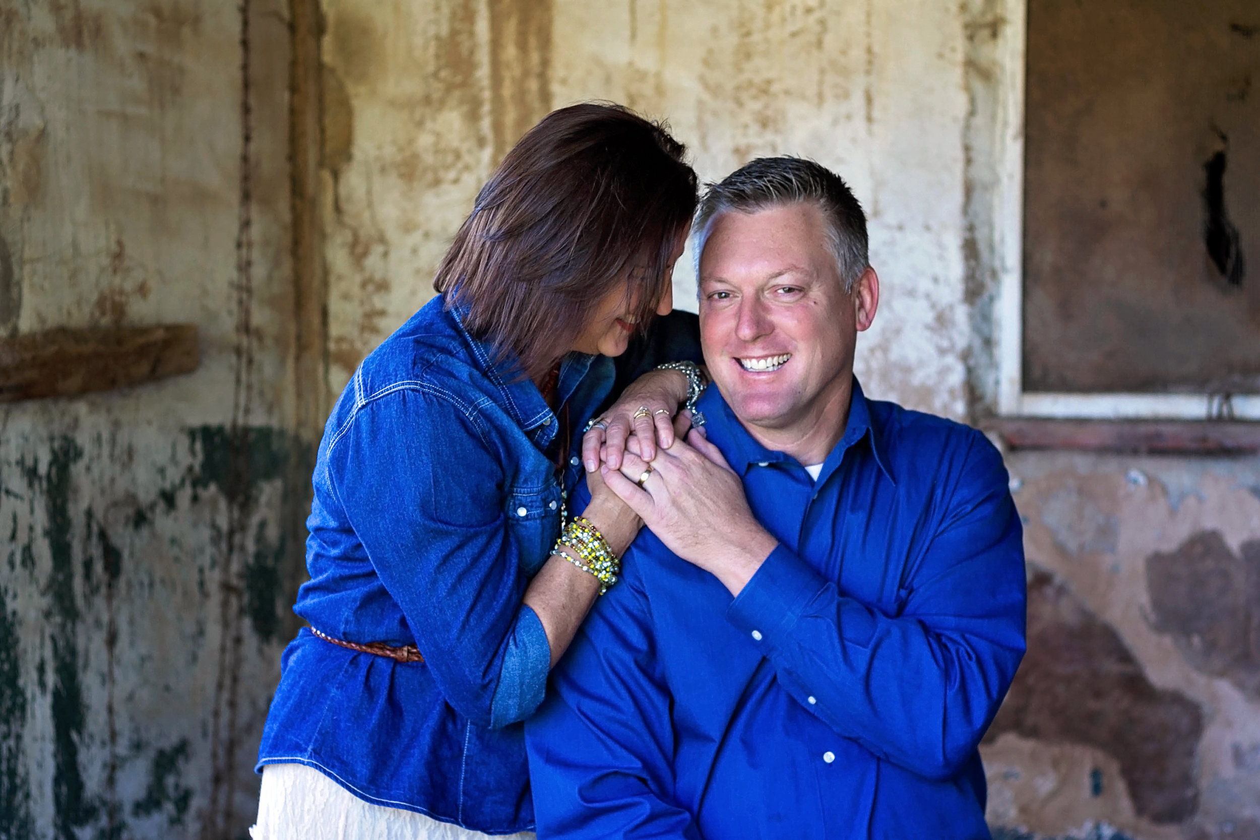 Couple in blue holding hands.jpg