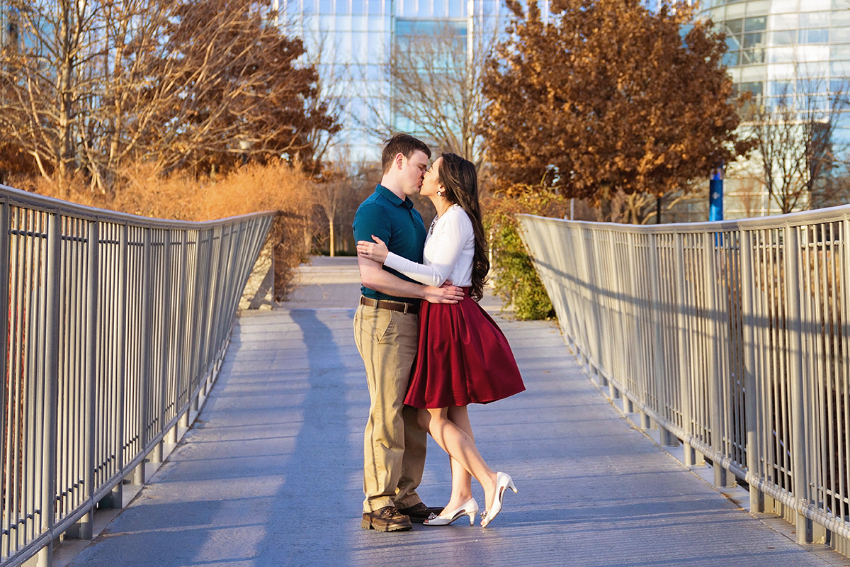 Couple kissing on a bridge in OKC.jpg