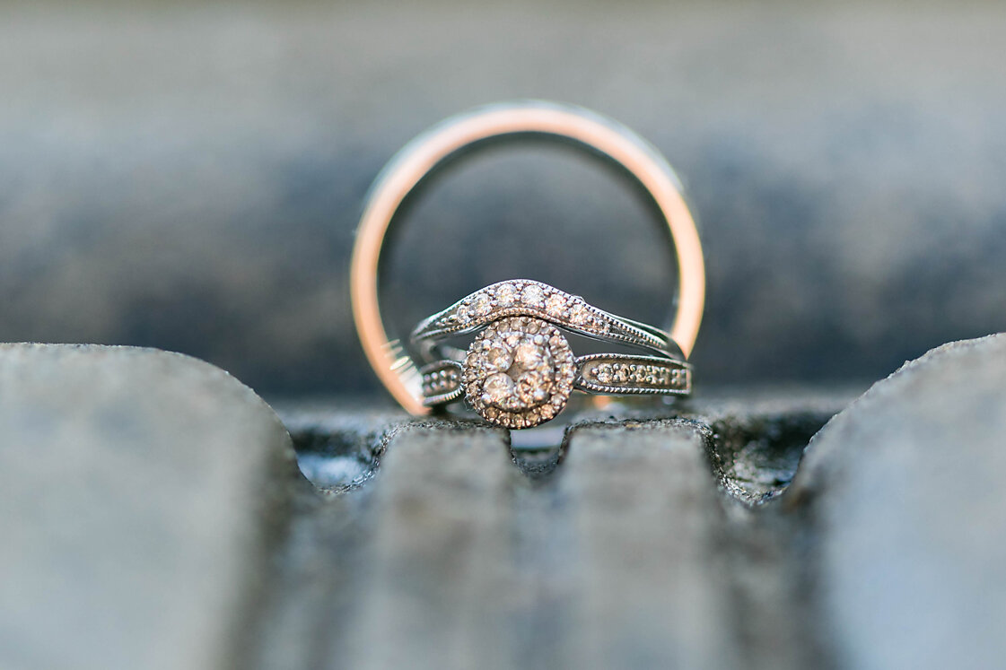 wedding rings on fountain base- parsons wedding- wedding details- rose briar place- oklahoma city weddings.jpg