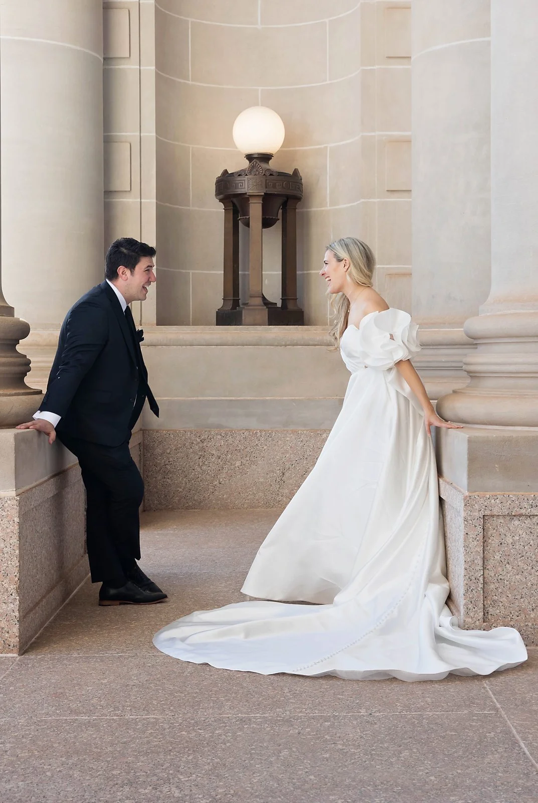 Bride and Groom between the collumns JSP Photography.jpg