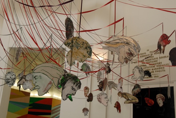 Nancy Spero, Maypole/ Take No Prisoners (detail), 2007 Handprinting on aluminum, ribbon, steel chain, and aluminum pole with steel base © The Nancy Spero and Leon Golub Foundation for the Arts Courtesy Galerie Lelong, New York.