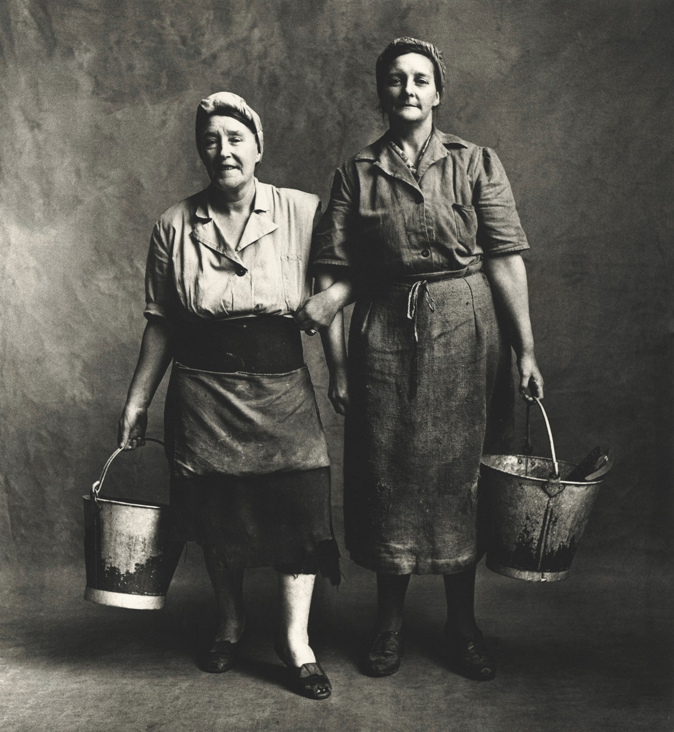 Charwomen, London, 1950 platinum palladium print mounted to aluminum image, 16 3/8 x 15 1/8 inches © Condé Nast (Br.)