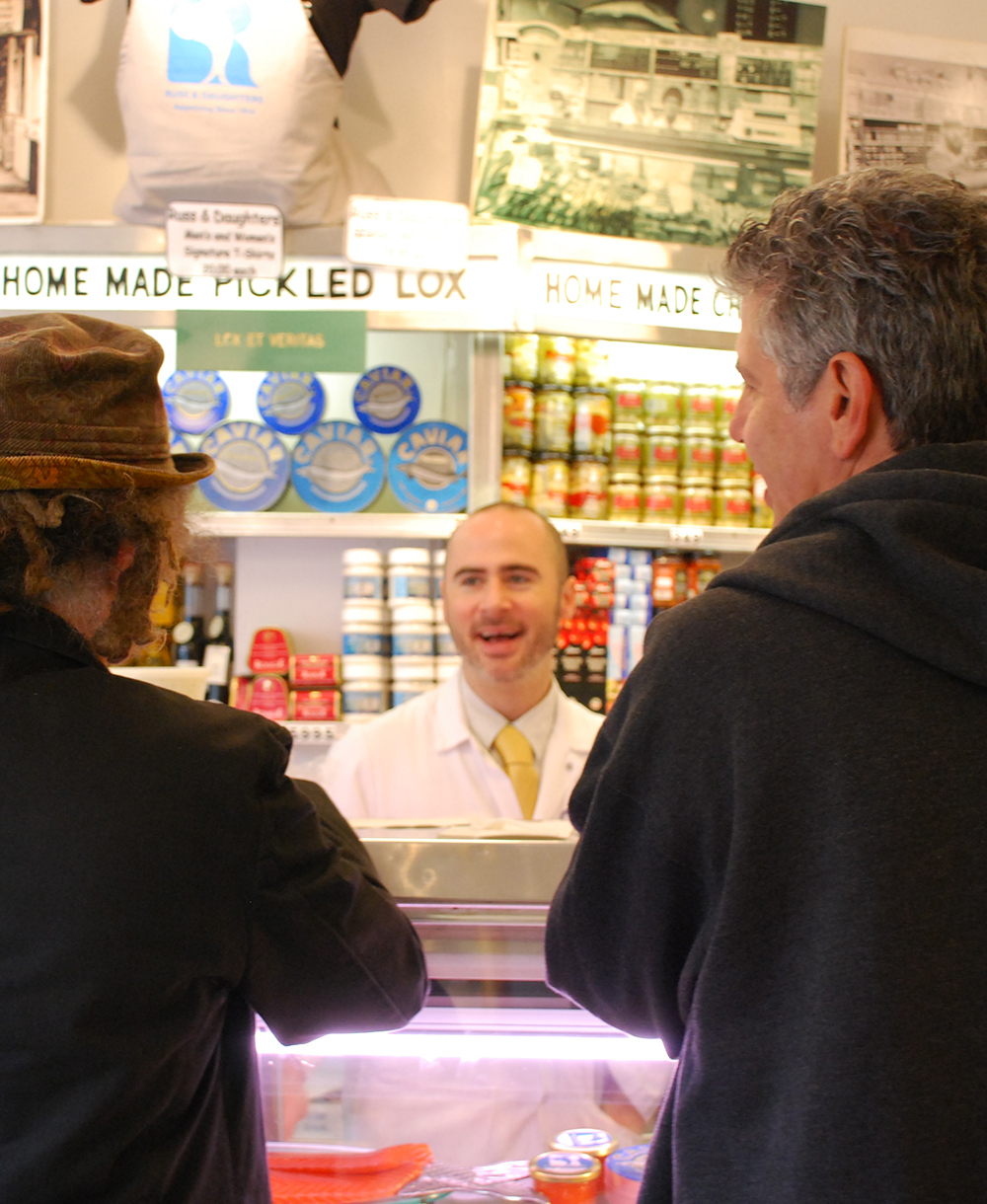 Staff and customers at counter