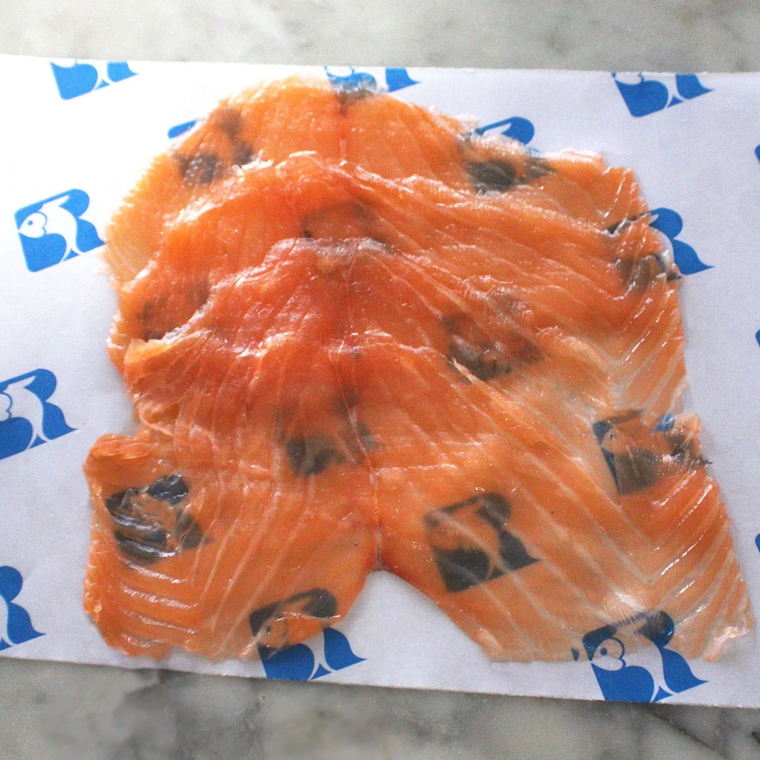 gaspe nova sliced on marble fish wax vertical.jpg