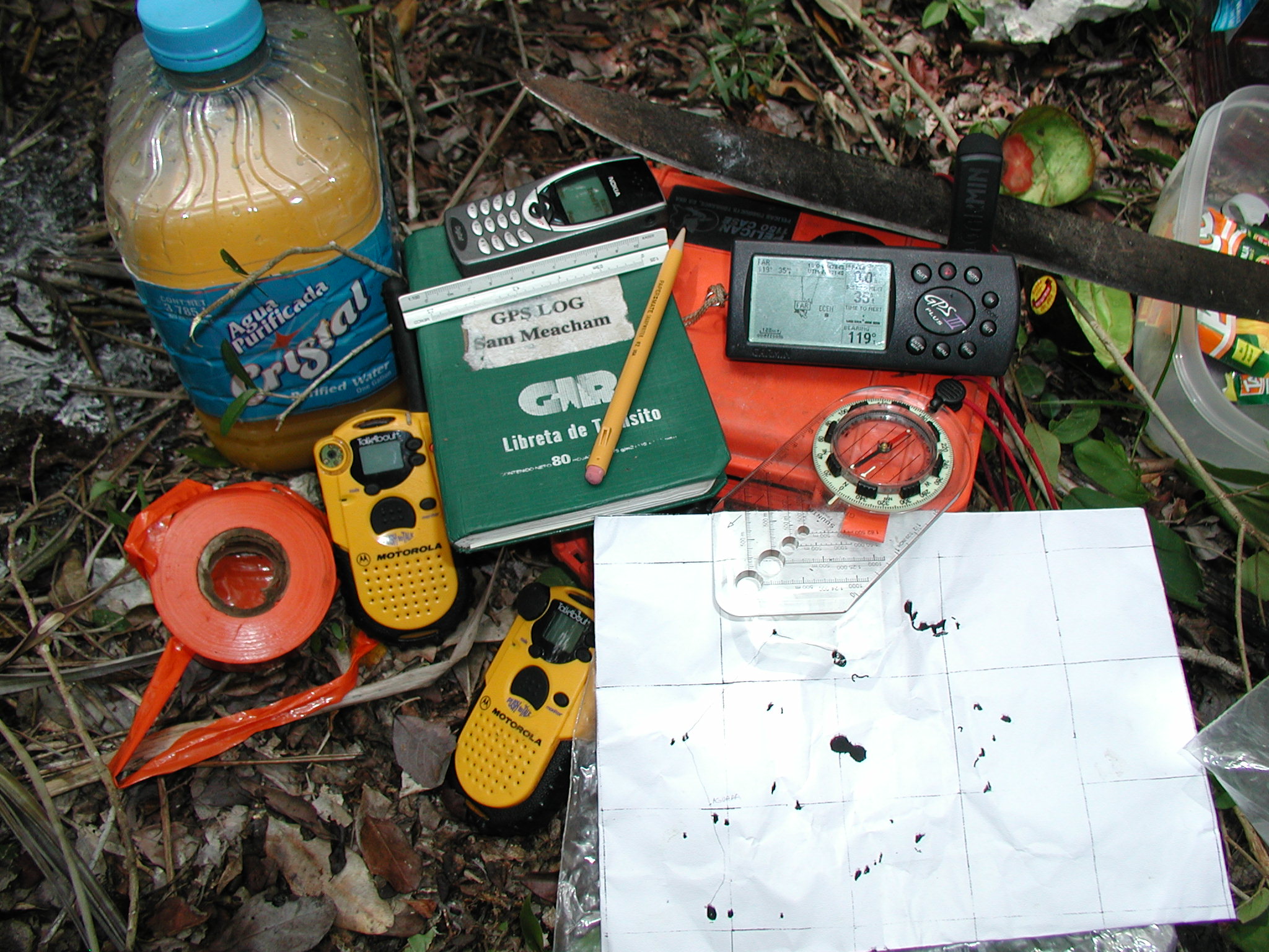 GPS, compass and a hybrid map made from topo maps and aerial photographs.