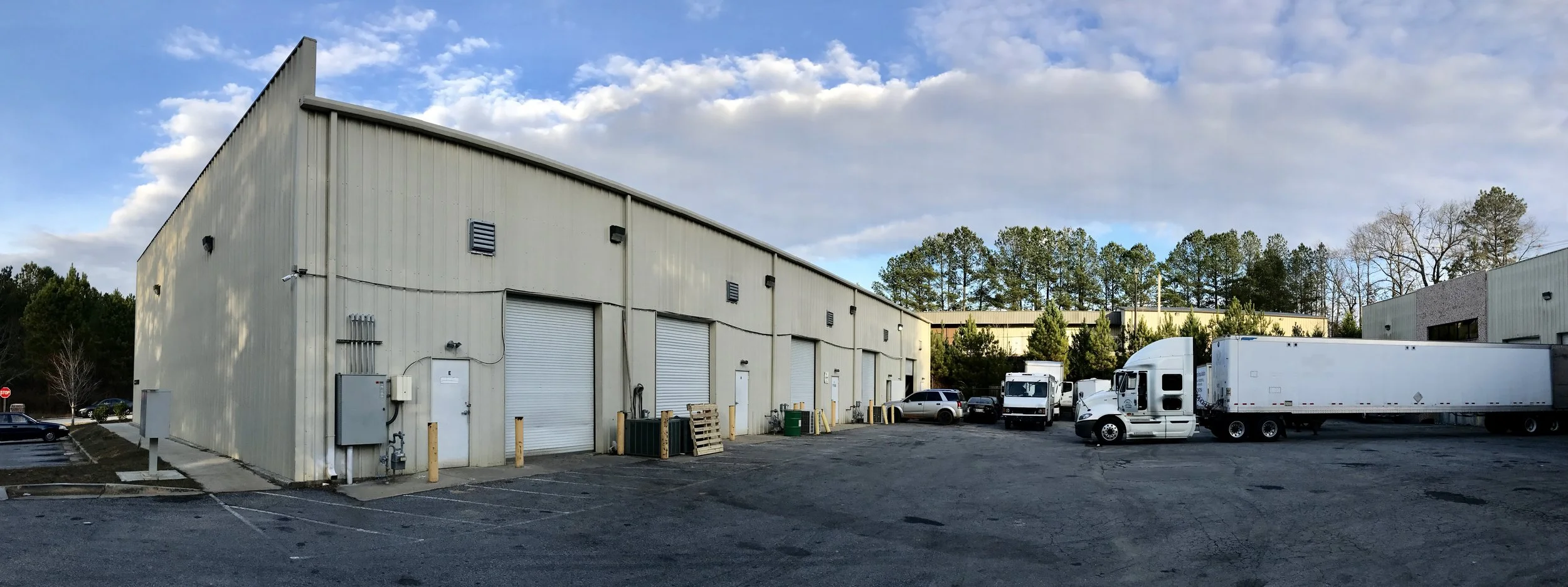 5 Roll-Up Doors on the back of each Office Warehouse Space