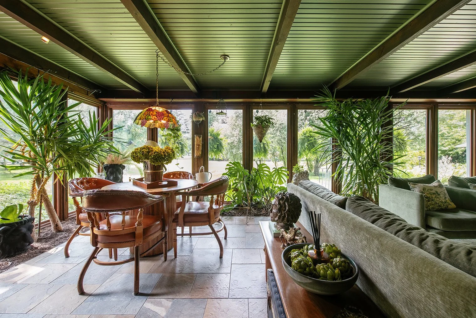 A historic Tudor TV room in Michigan, where layered character and everyday comfort create a relaxed space to unwind, as seen through The Gratz Life.