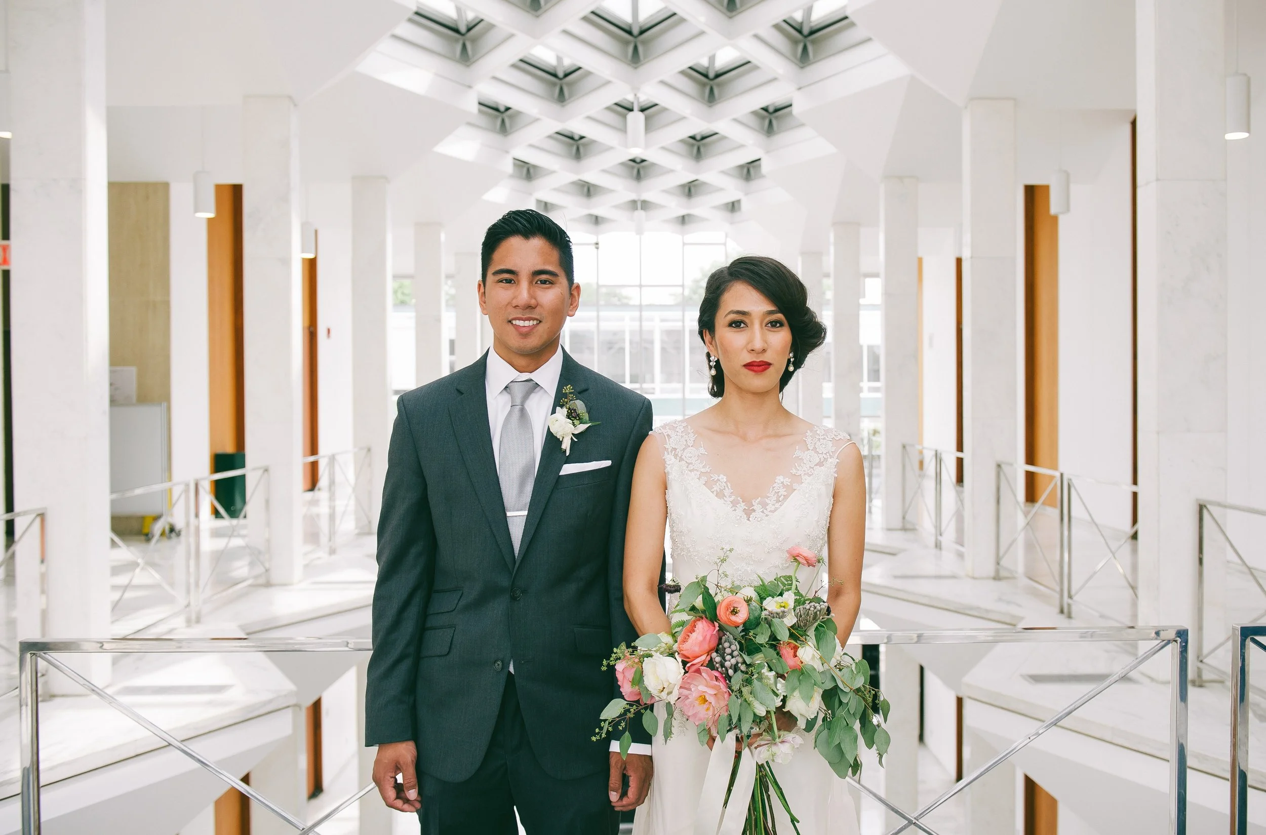   Candid wedding moment photographed in Detroit by a Detroit wedding photographer during a city celebration.  