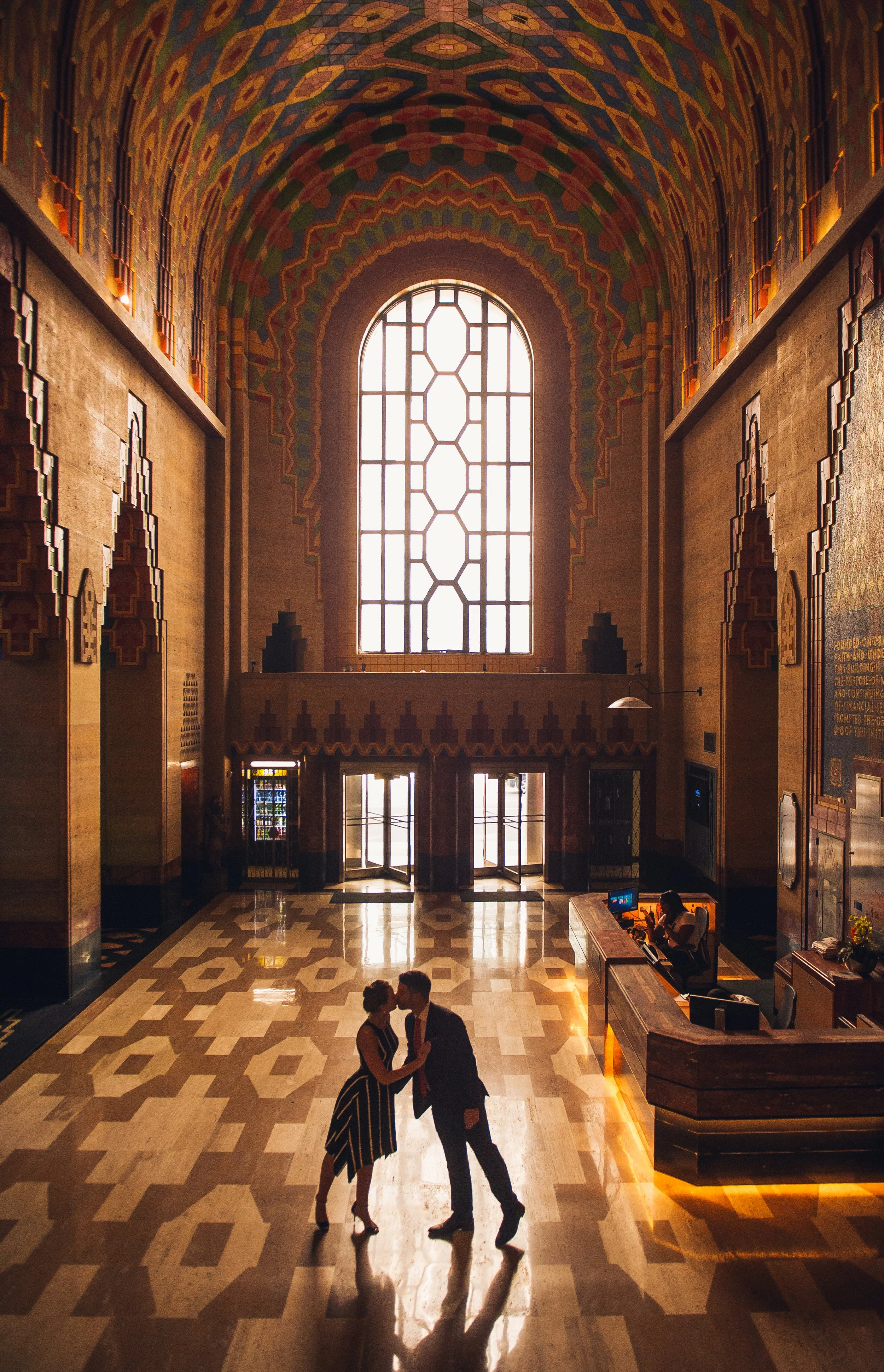   Bride and groom walking through Detroit, photographed by a Detroit wedding photographer.  