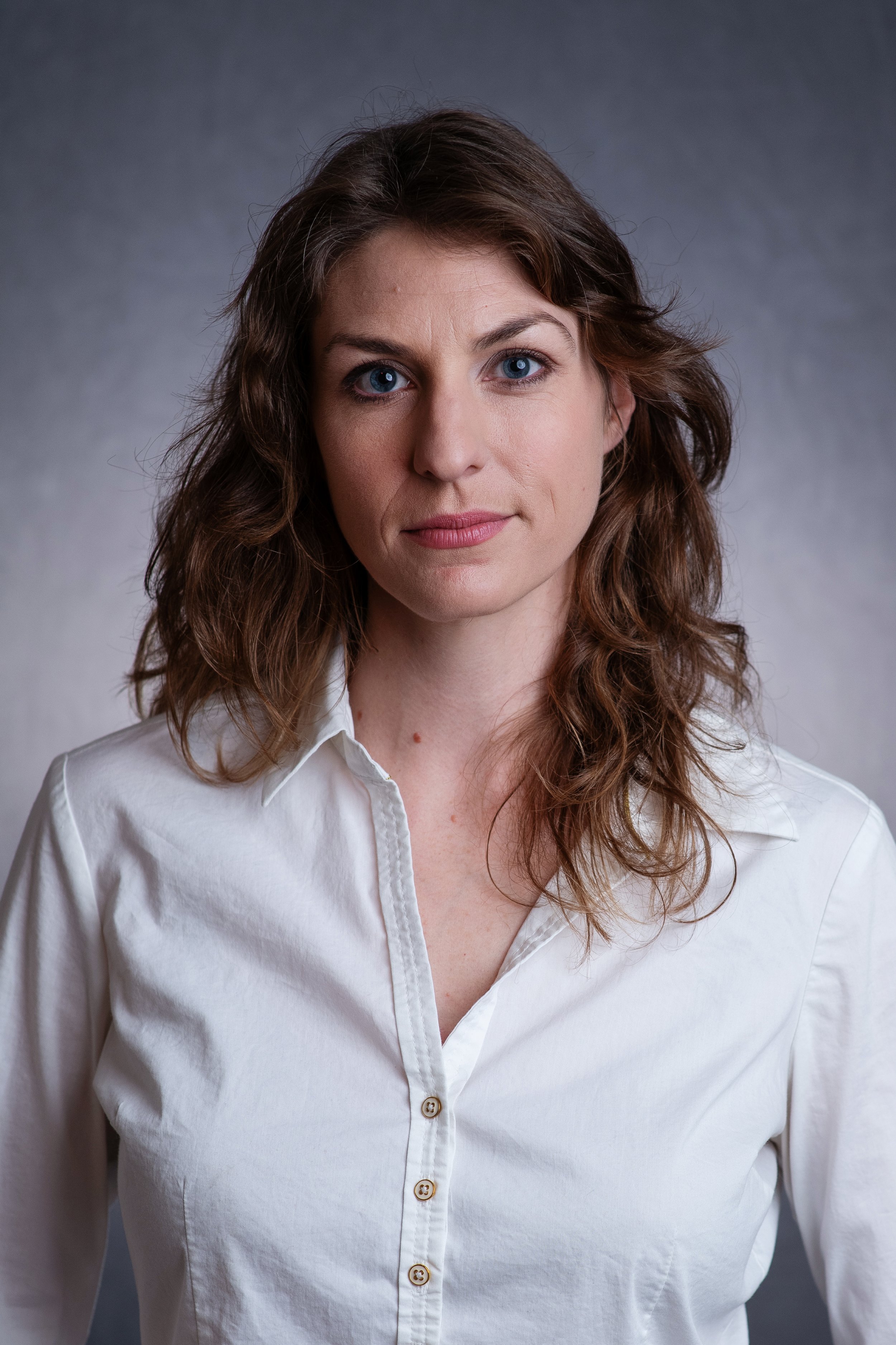   Corporate headshot session in Detroit documented by a Detroit-based headshot photographer.  