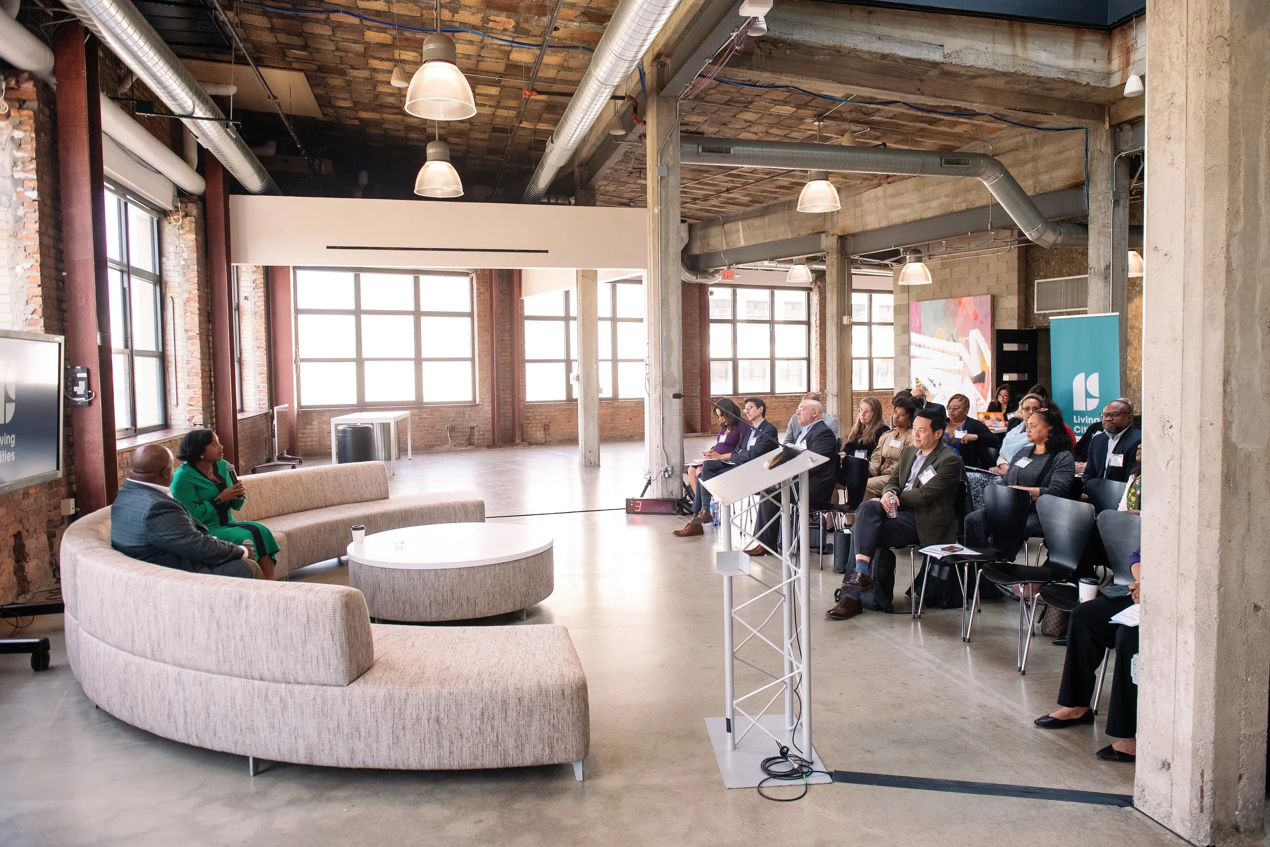   Business conference in Detroit photographed to capture engagement and setting.  