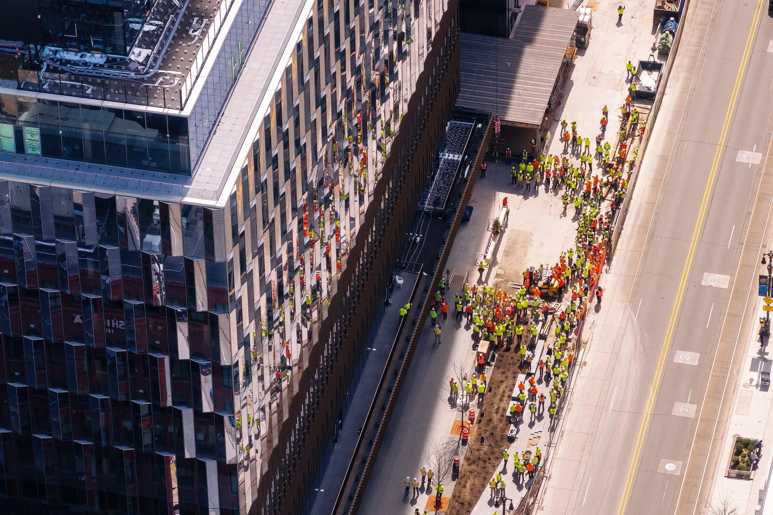   Ceremonial moment during the Hudson’s Detroit topping off in Detroit, part of Bedrock’s development designed by SHoP Architects.  