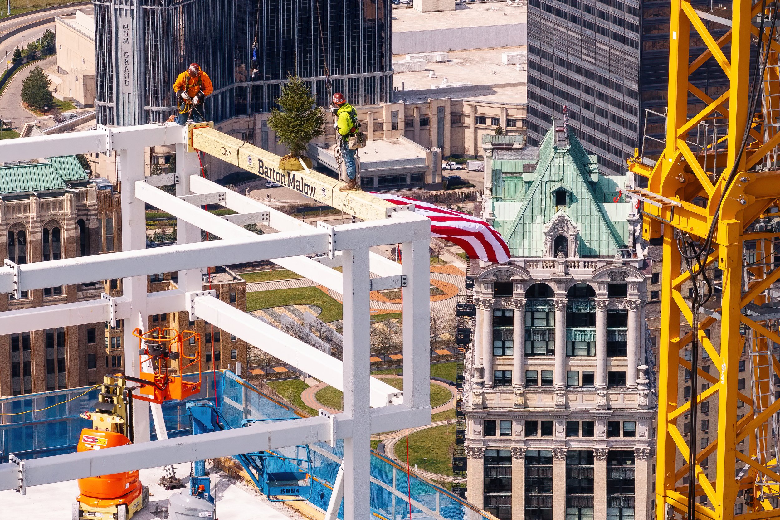   Final structural beam prepared during Hudson’s Detroit topping off in Detroit for Bedrock and SHoP Architects.  