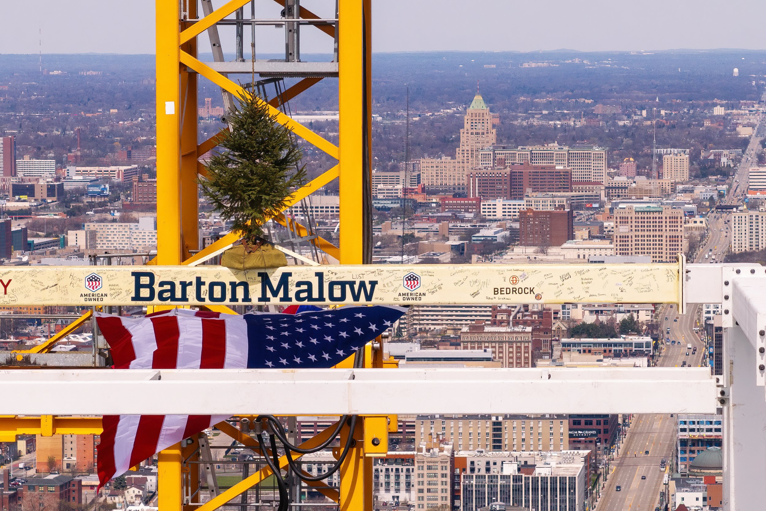   Workers and officials at Hudson’s Detroit topping off event in Detroit, architecture by SHoP Architects for Bedrock.  