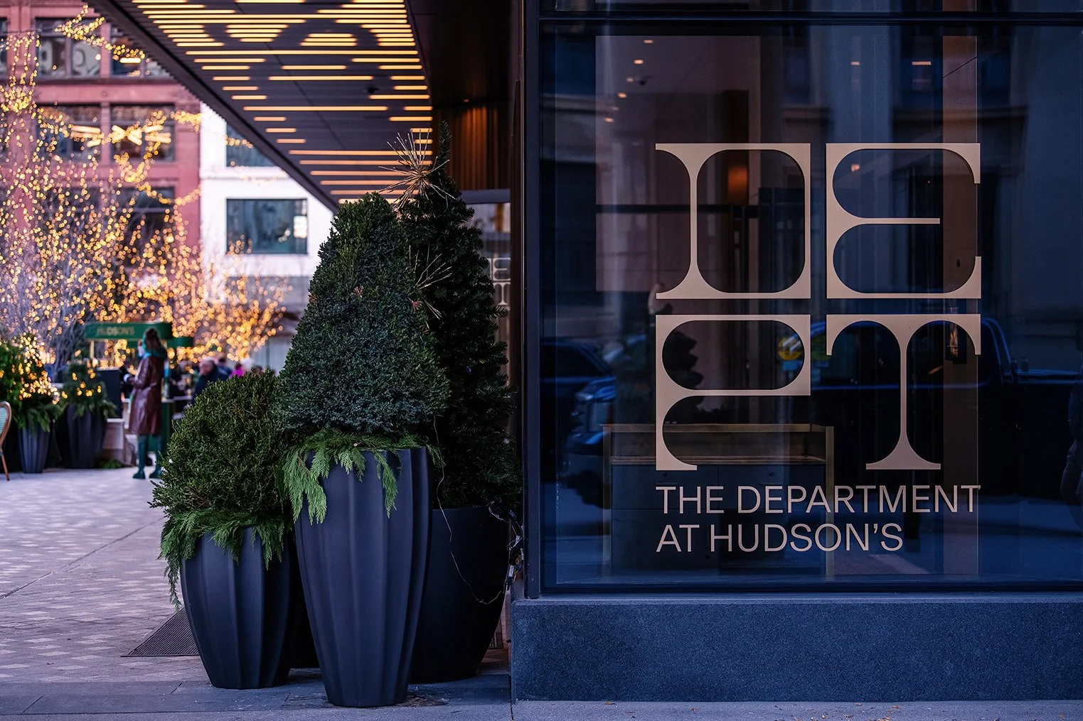   Crowd gathered for holiday festivities at Nick Gilbert Way at Hudson’s Detroit, a Bedrock project by SHoP Architects.  