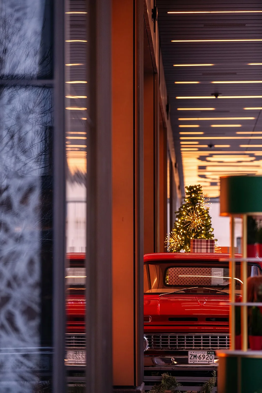   People exploring the holiday activation at Nick Gilbert Way in Detroit at Hudson’s Detroit by SHoP Architects for Bedrock.  