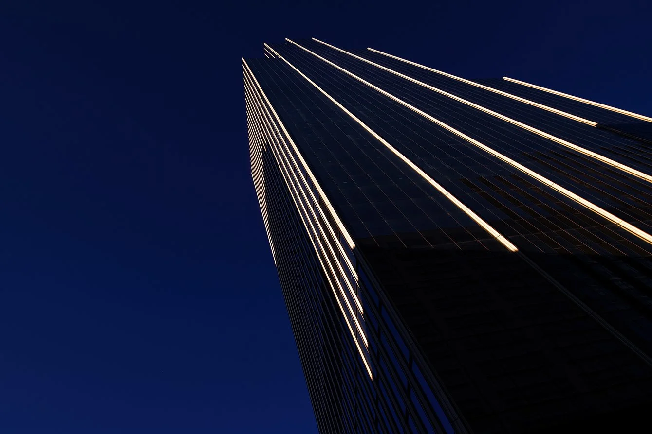  Street-level urban scene showing Hudson’s Detroit in downtown Detroit for Bedrock. 