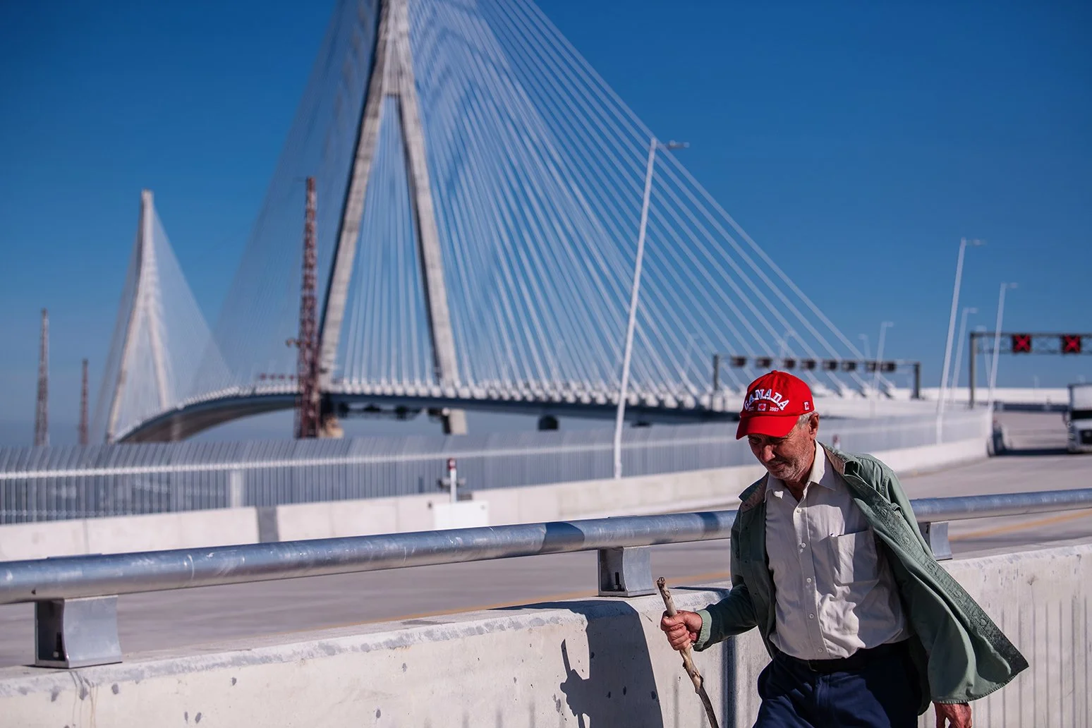 Gordie Howe International Bridge opening celebration with people walking from Detroit toward Windsor.