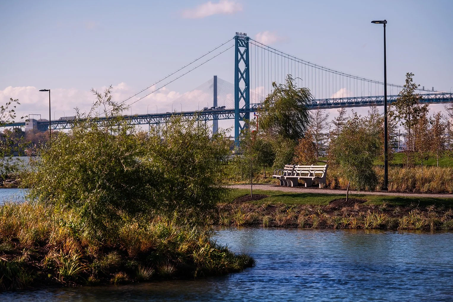 Panoramic view of Ralph C. Wilson Jr. Park in Detroit, highlighting the riverfront landscape delivered by the Detroit Riverfront Conservancy and MVVA.