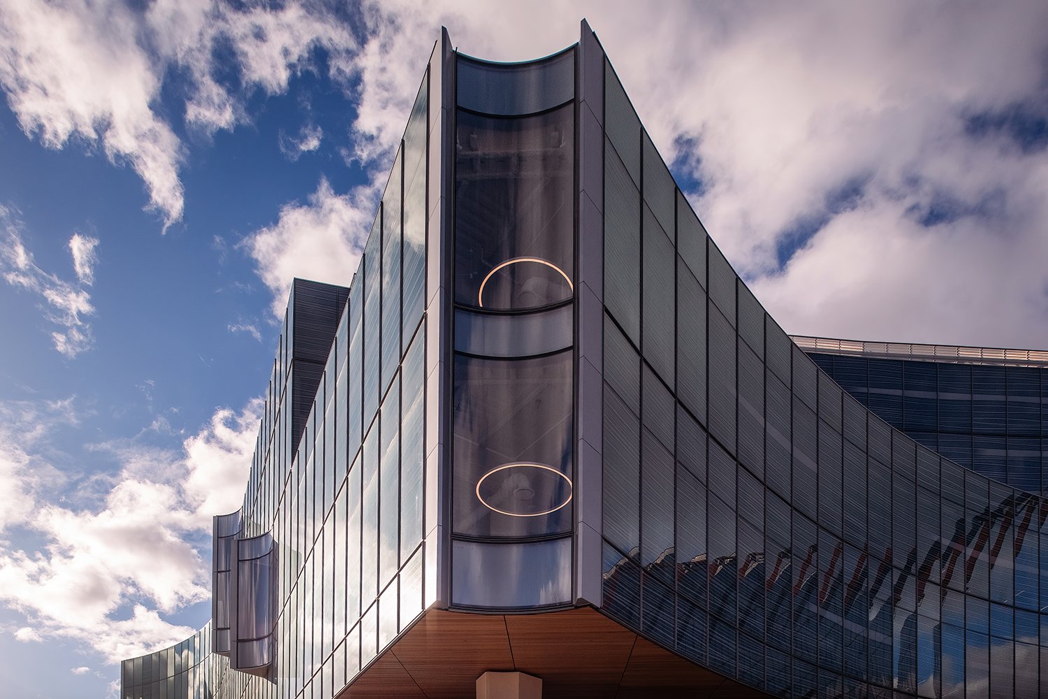 Exterior view of the Ford World Headquarters, showing a light-filled, contemporary workspace designed by Snøhetta.