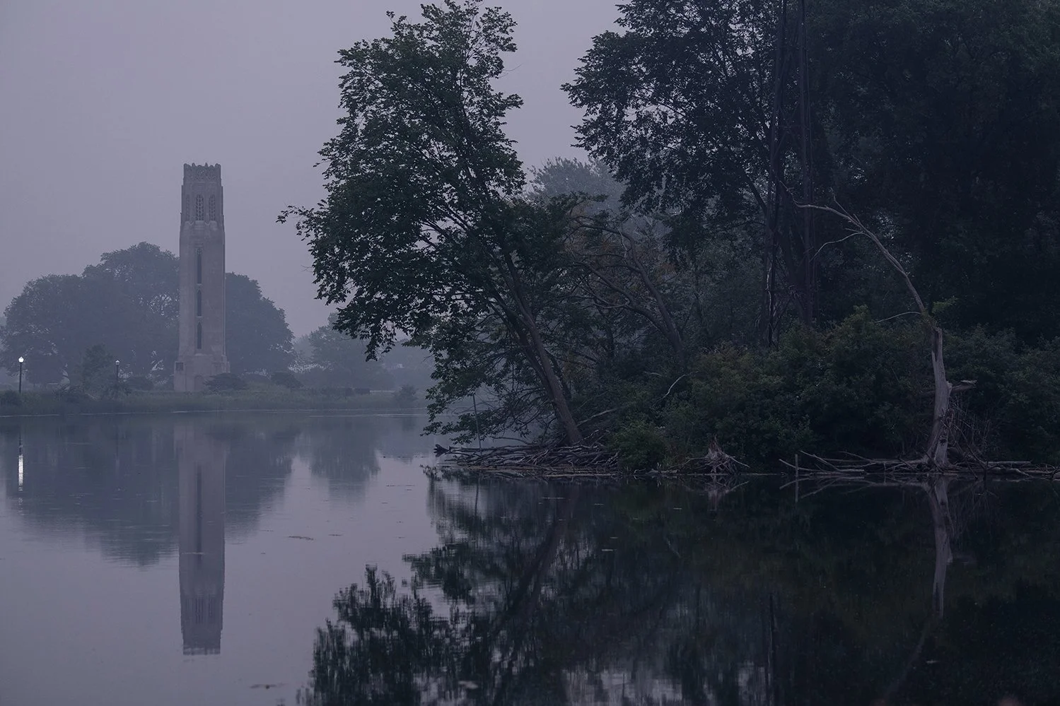 Wildfire smoke creates a hazy view across Belle Isle in Detroit, Michigan, during summer air quality conditions.