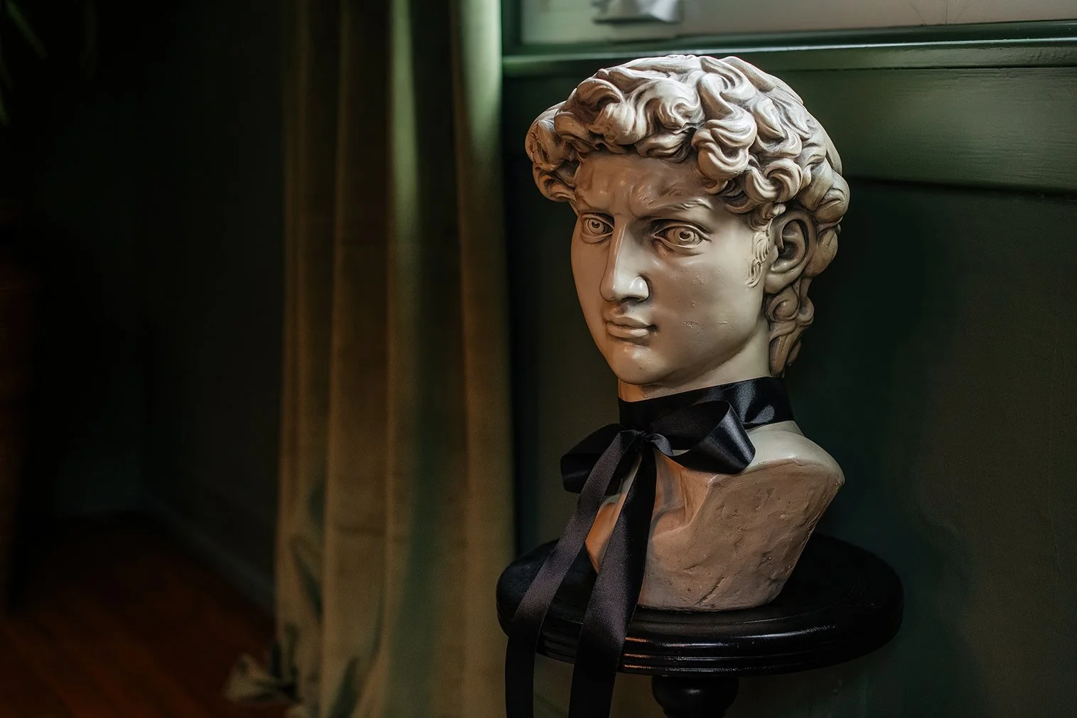 Muted tones and timeworn details give this historic dining room a sense of permanence, rooted in Michigan and captured by The Gratz Life.