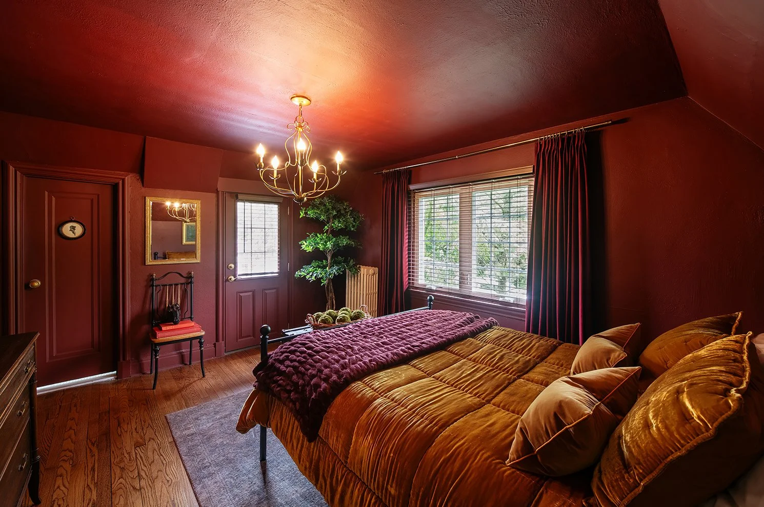 A historic Tudor guest bedroom in Michigan, where comfort and character come together to create a welcoming retreat, as seen through The Gratz Life.