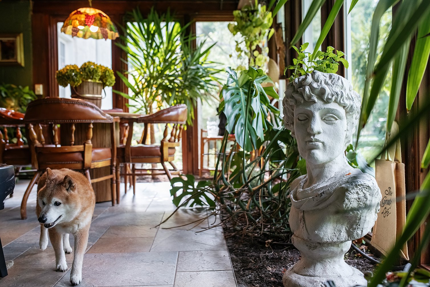 Influenced by classic Tudor style, this TV room blends history and ease, reflecting the lived-in warmth of a Michigan home curated by The Gratz Life.