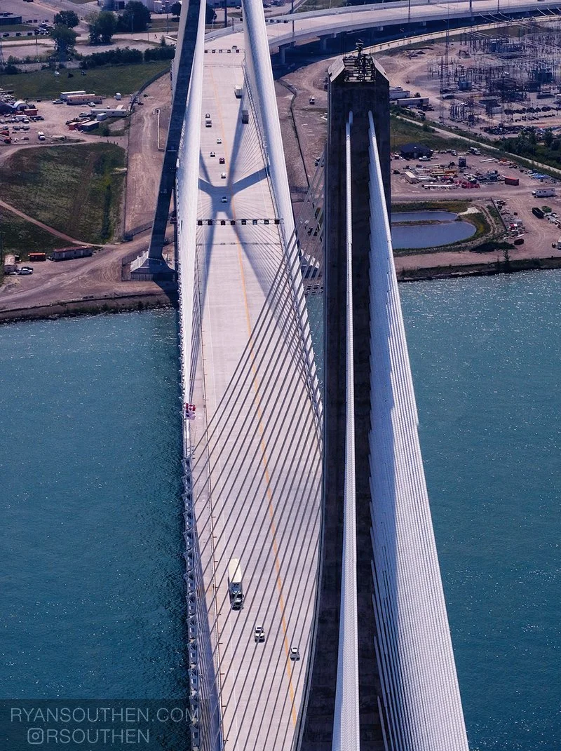 Opening-day view of the Gordie Howe International Bridge in Detroit, showcasing the cable-stayed design by AECOM.