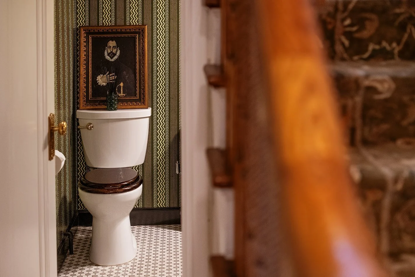A historic Tudor powder room in Michigan, where classic character and quiet charm come together in a small but storied space, as seen through The Gratz Life.