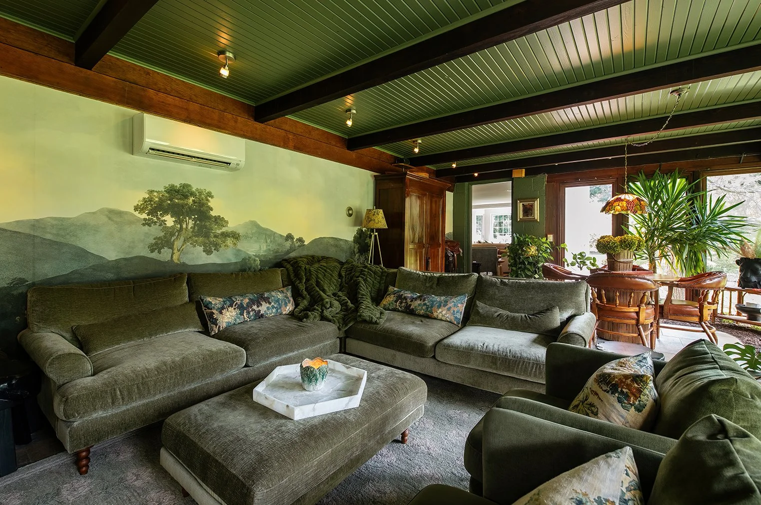 Soft light and timeworn charm give this Tudor TV room its sense of place, turning a casual gathering space into an extension of The Gratz Life.