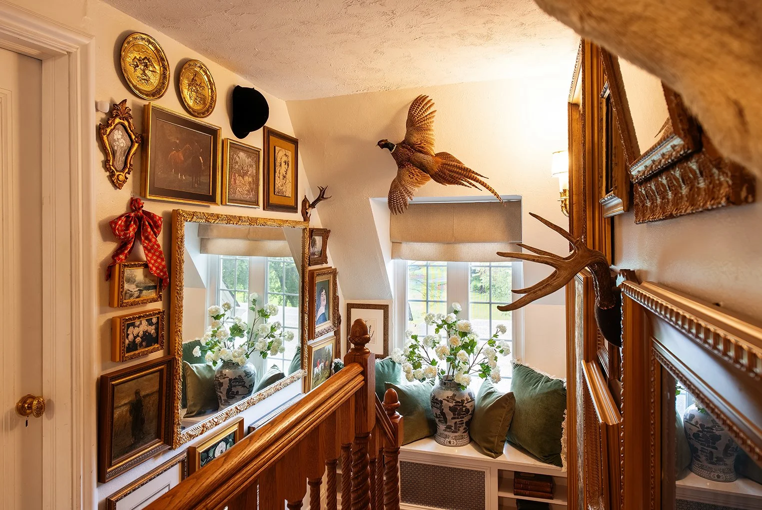 A historic Tudor stairwell in Michigan, where movement through the home becomes an experience shaped by time, character, and the quiet elegance of The Gratz Life.