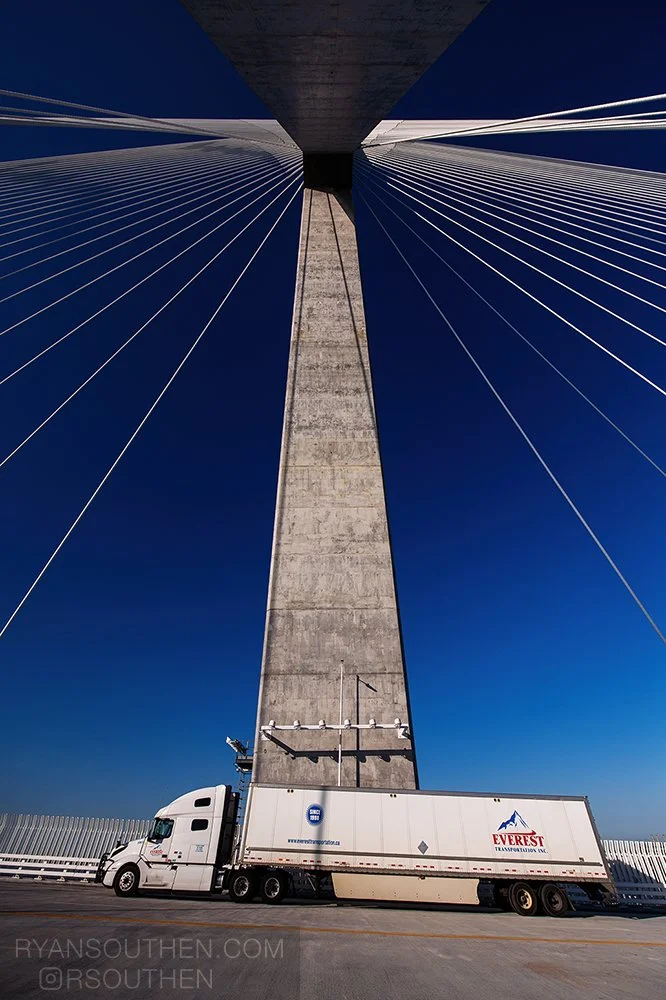 People gathering on the Gordie Howe International Bridge during the opening of the pedestrian connection between Detroit and Windsor.