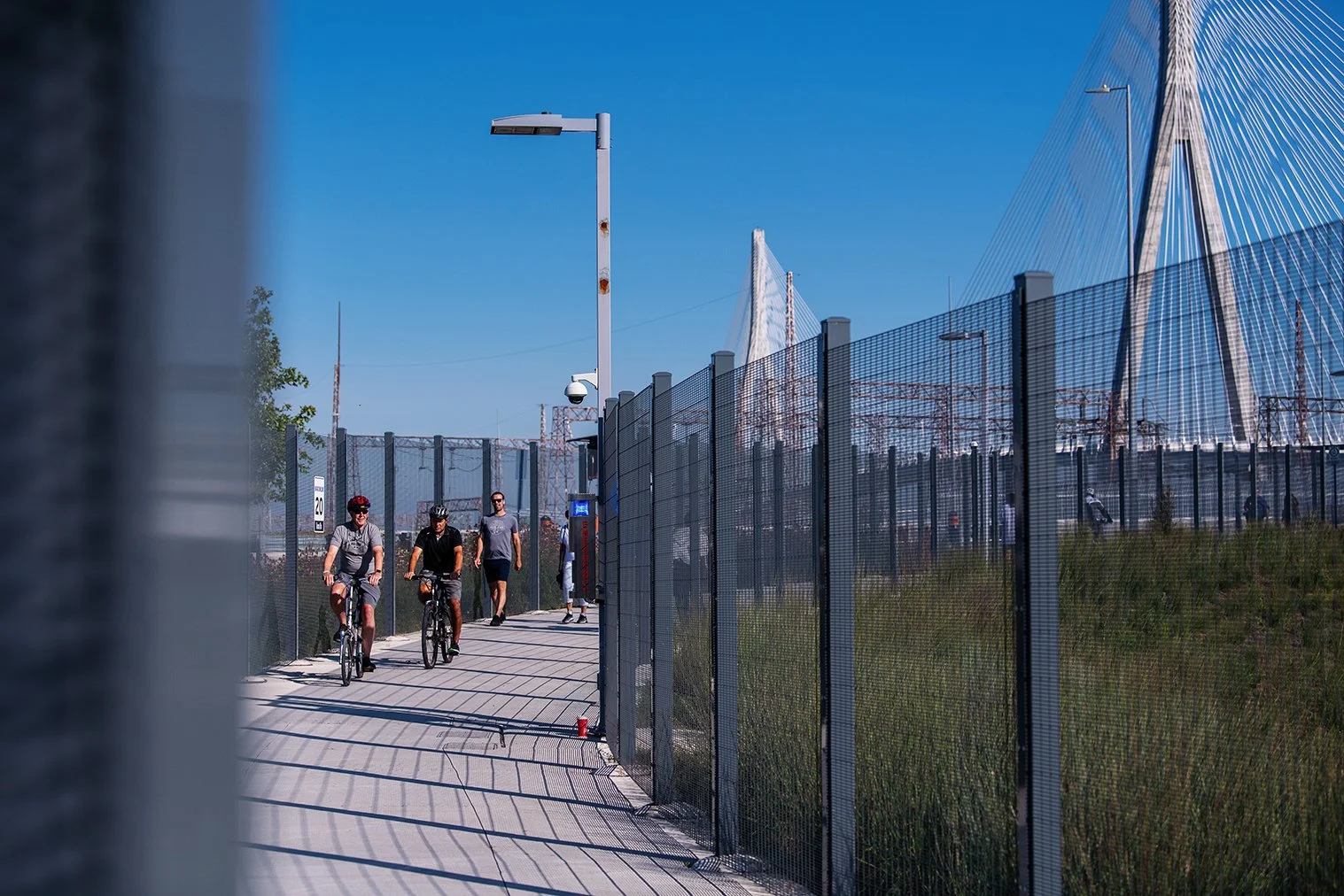 Detroit and Windsor connected by pedestrians walking the Gordie Howe International Bridge during its grand opening.